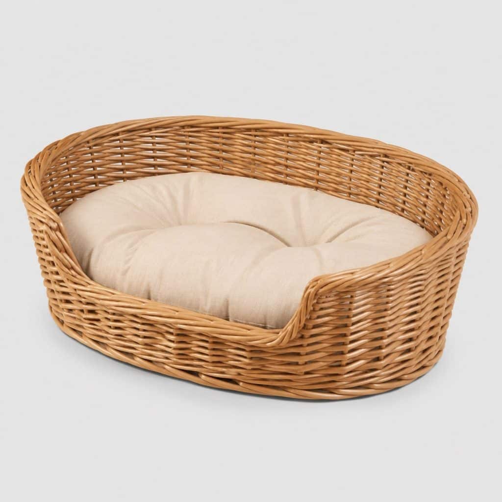 Petit panier ovale en osier tressé de 45 cm avec son coussin en coton